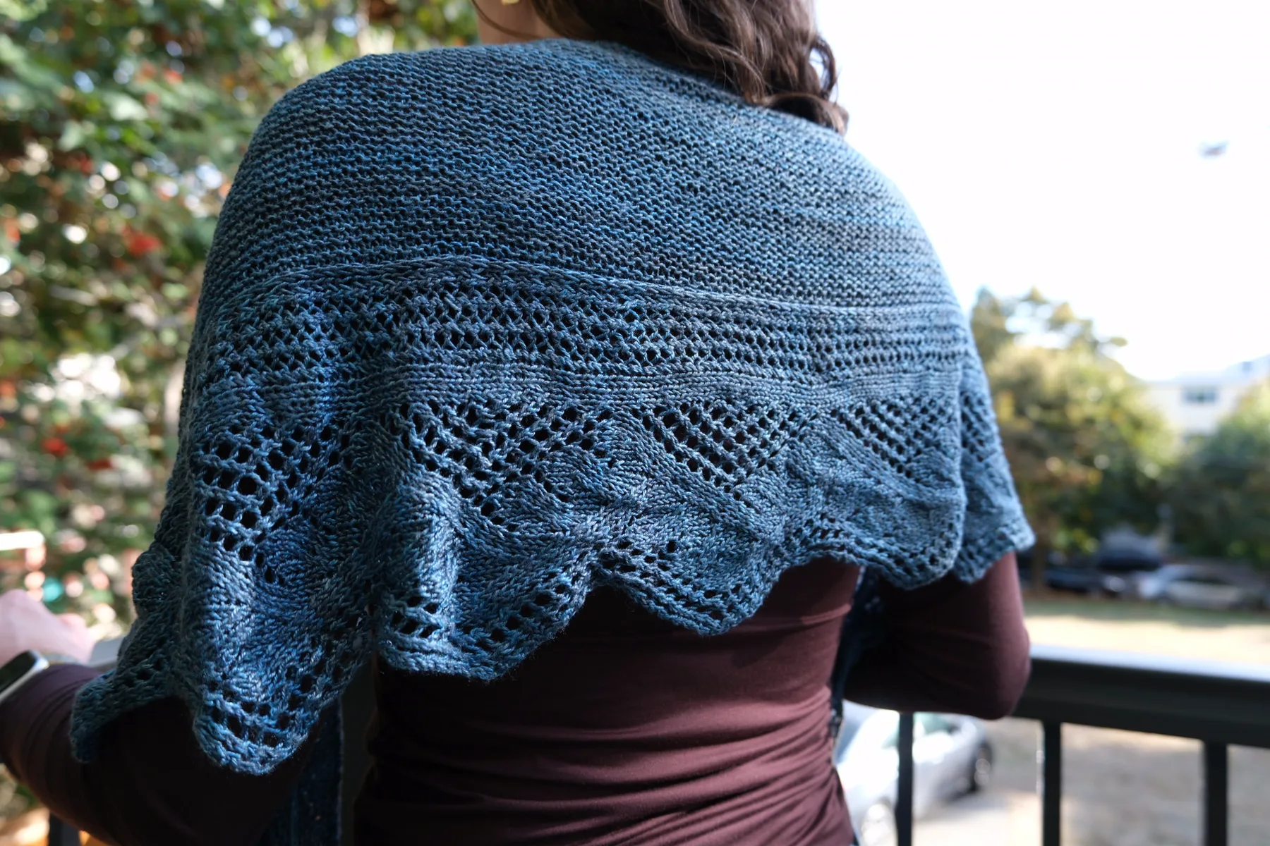 Close-up of a blue hand-knitted textile outdoors